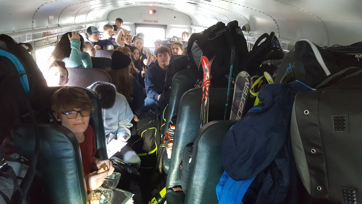 Packed bus ride with Jefferson Ski Team